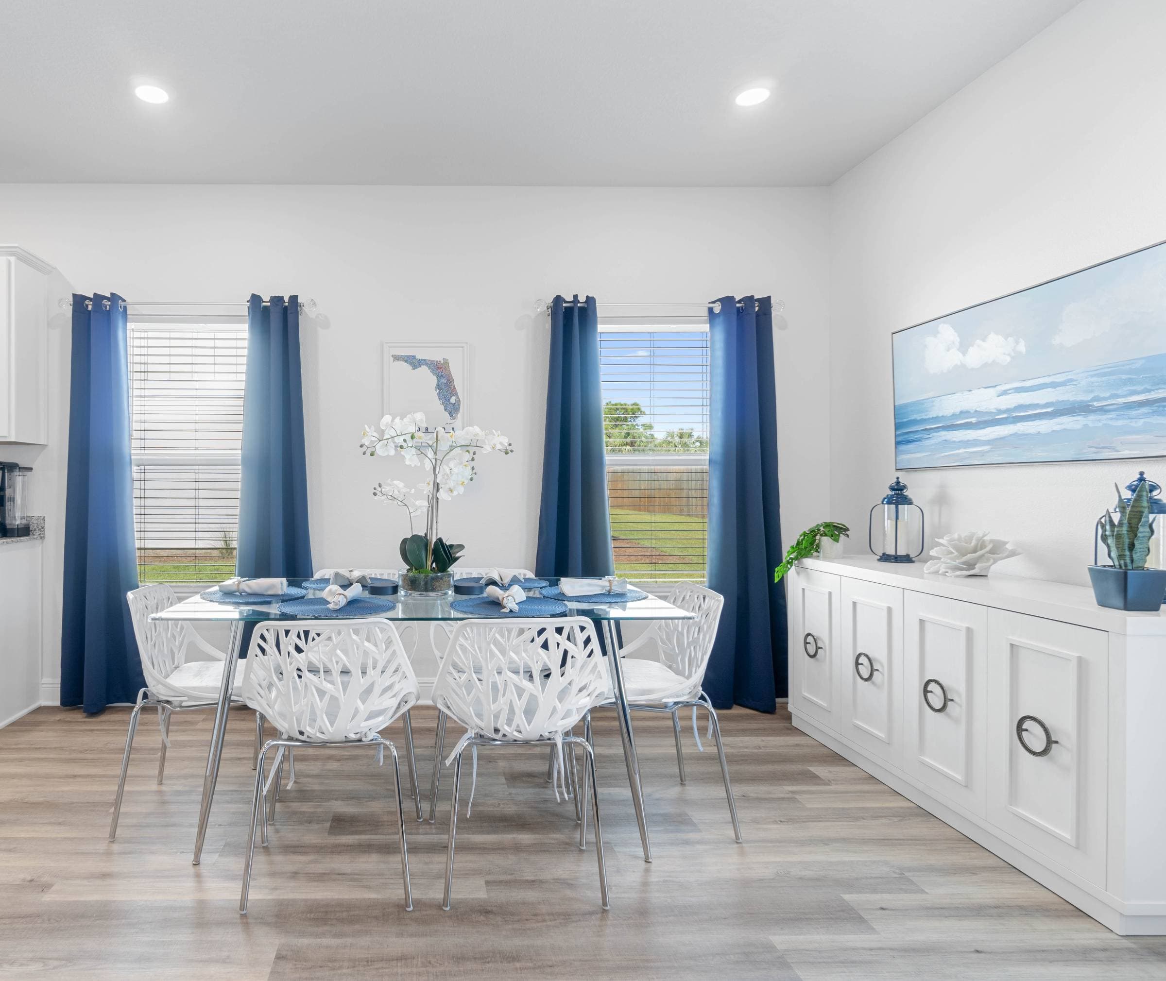 Enjoy elegant dining setting for 6 (additional seating is available at the island with 4 barstools). Enjoy extra placemats, table cloth, board games stored in the sideboard. Dining table is made of tempered glass.
