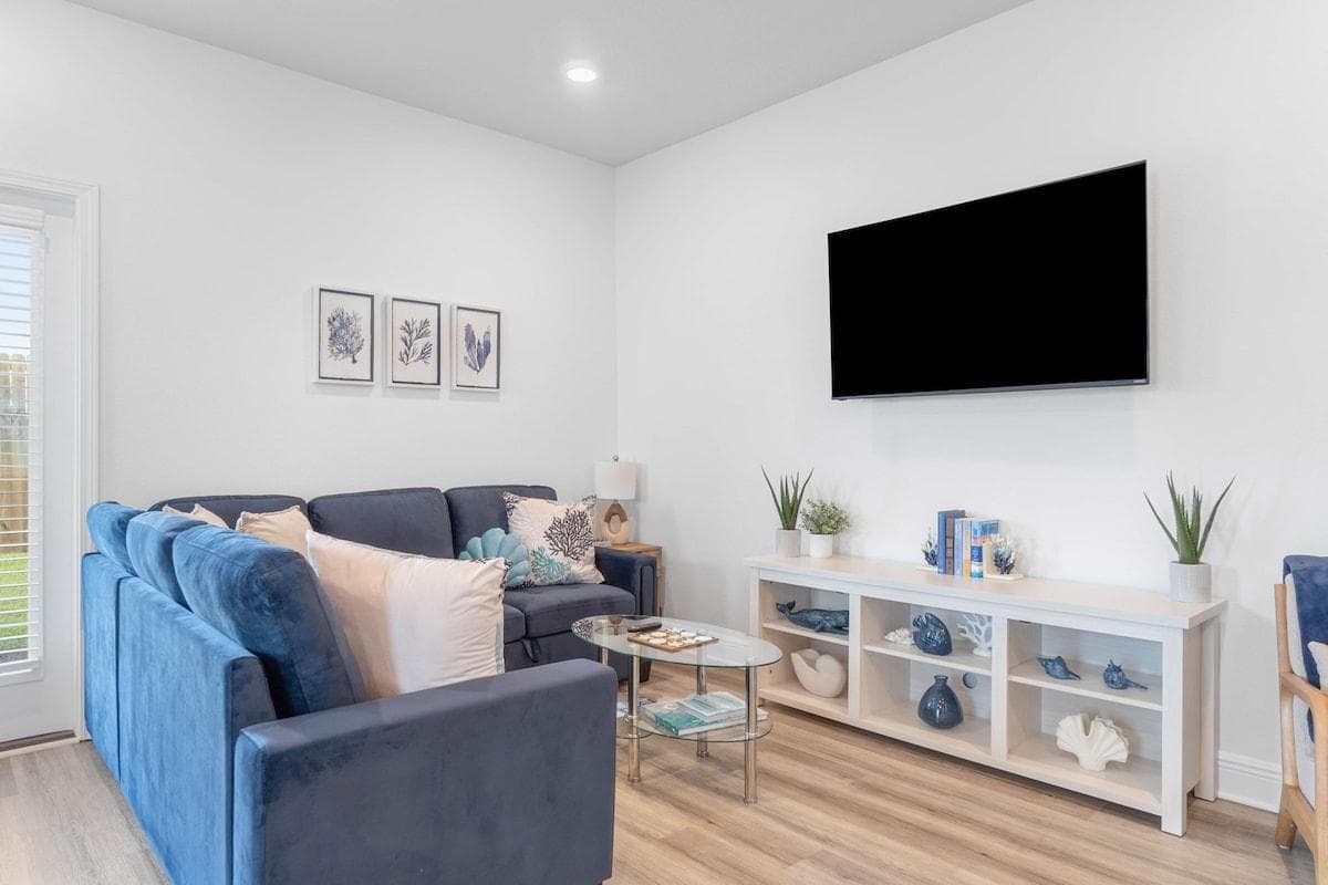 Snuggle Up Buttercup: pull out sleeper sectional module transforms the modular L shaped sofa from a daily seating area into a comfortable bed for guests or an ideal spot for movie nights, paired with 55" UHD LED Roku TV with rotate&tilt mount.